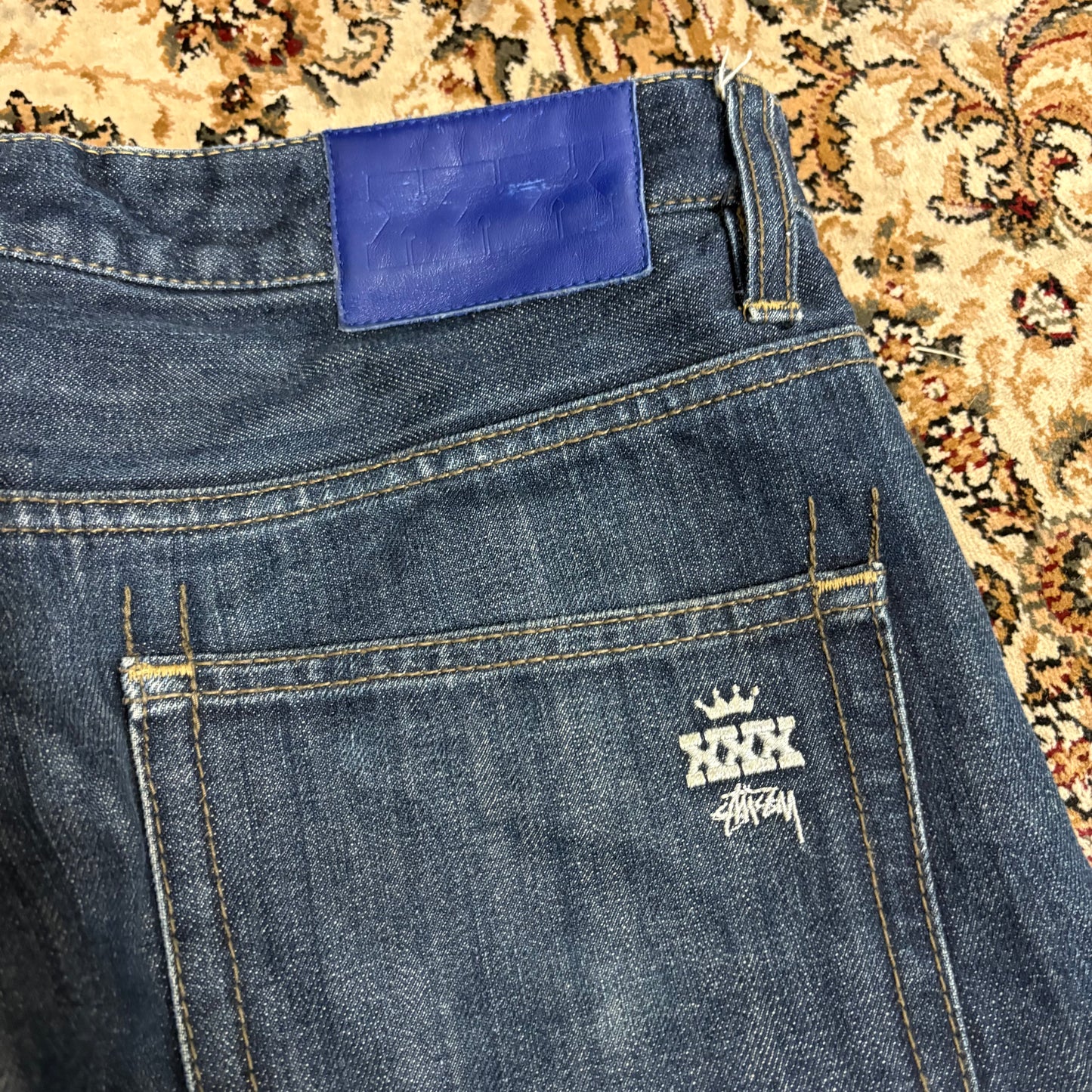 Stussy navy blue embroidered jeans (W36” L30”)