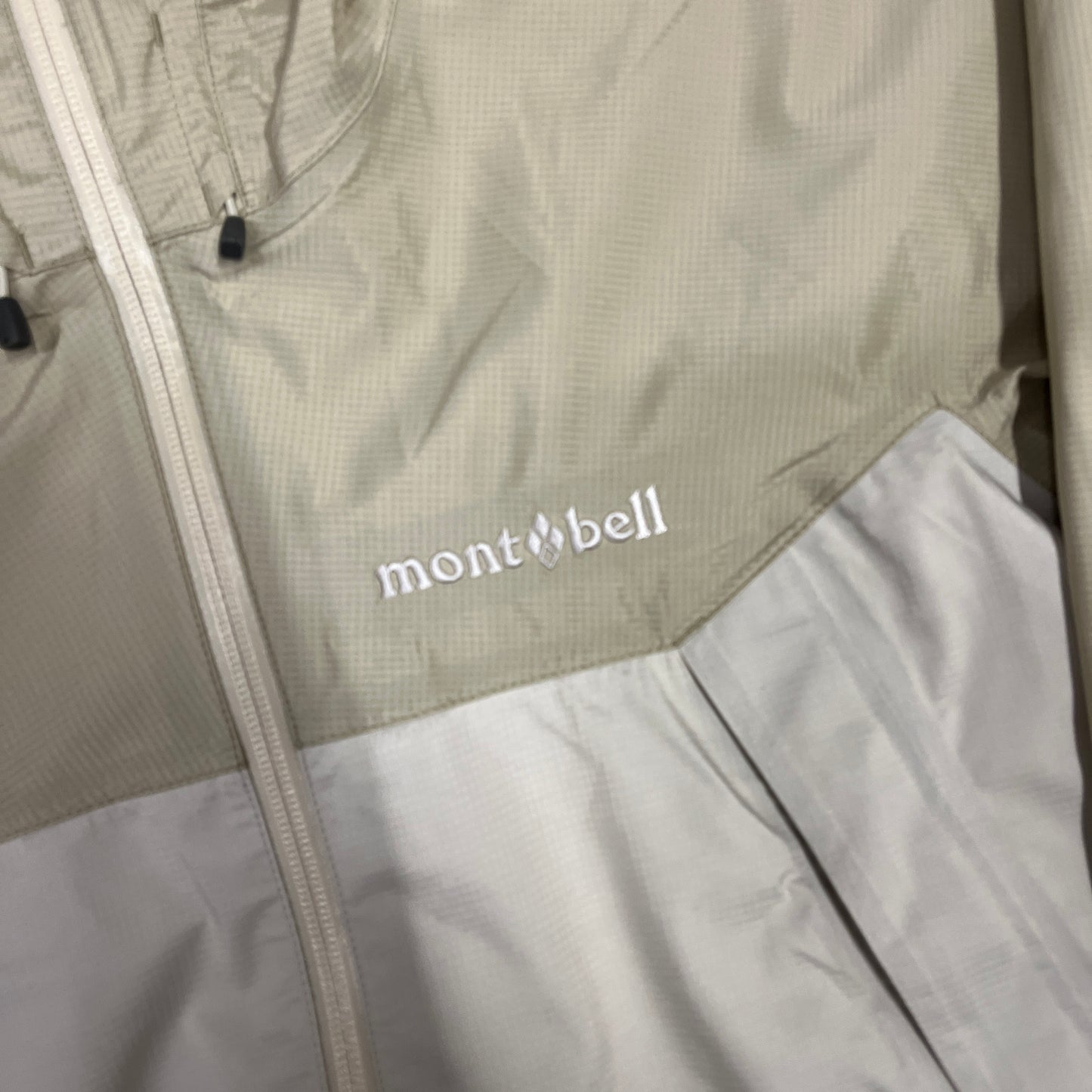 Montbell two tone cream waterproof shell jacket (XL)