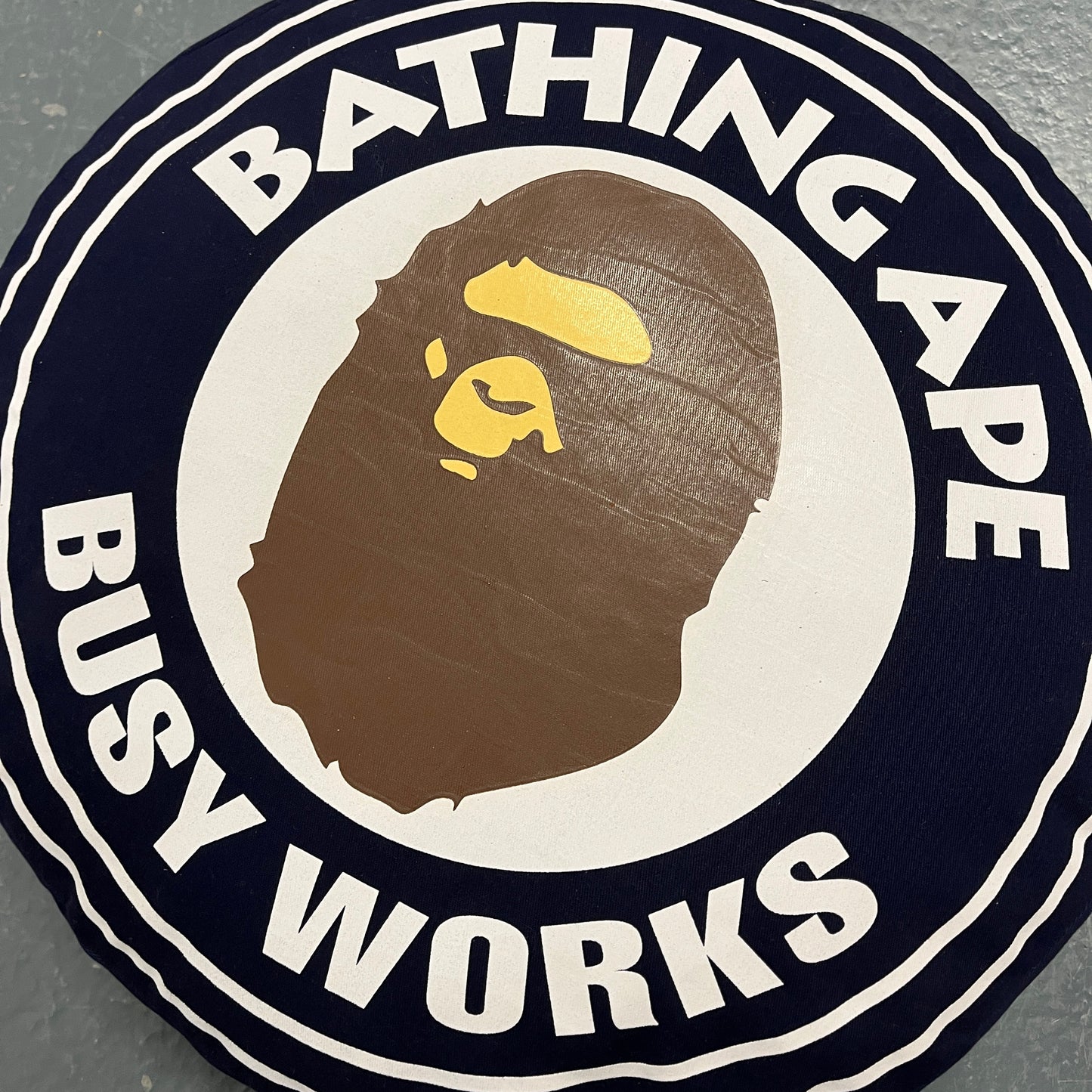 BAPE “busy works” navy cushion