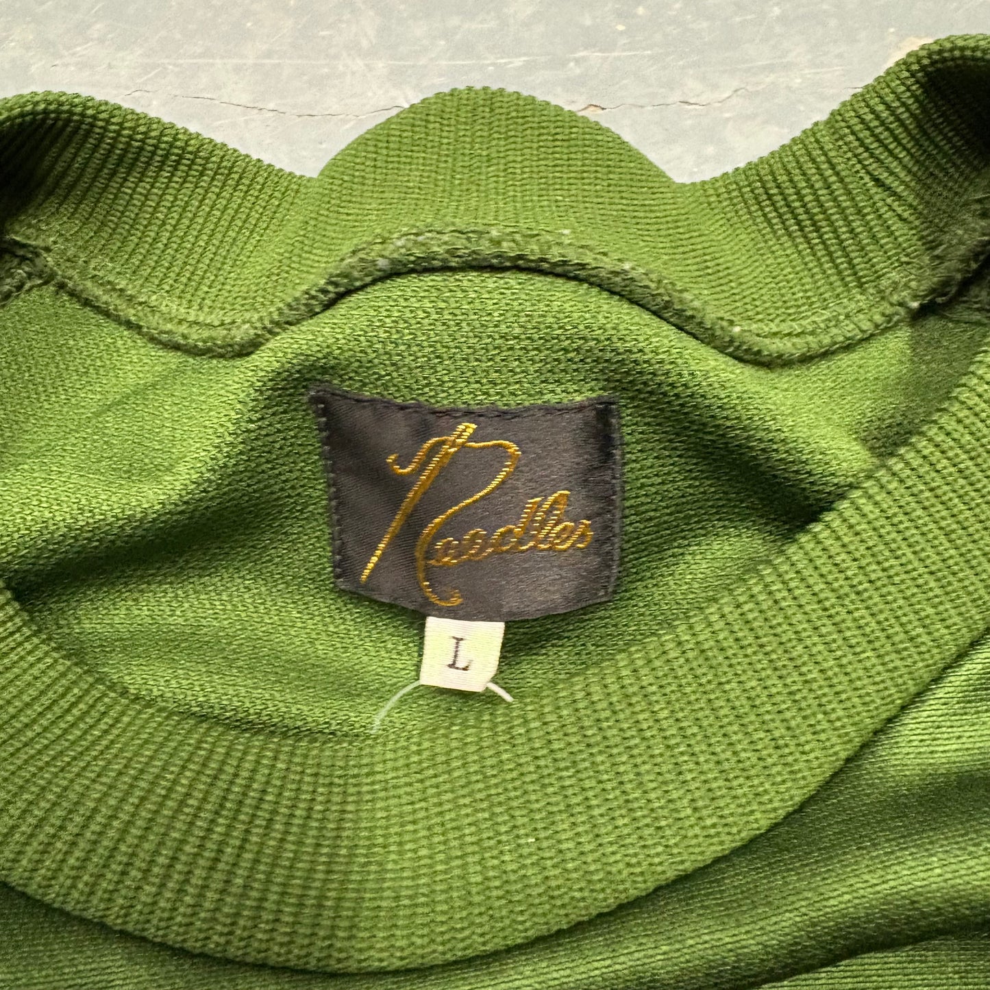 Needles green / purple sweatshirt (L)