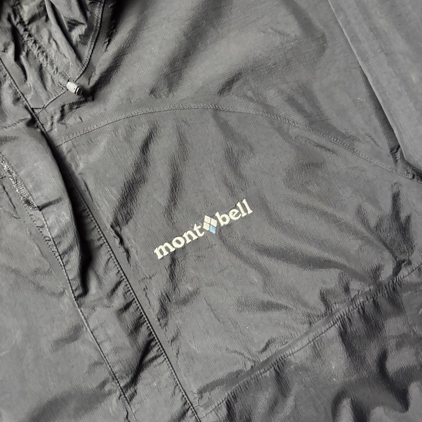 Montbell black waterproof shell jacket (L)