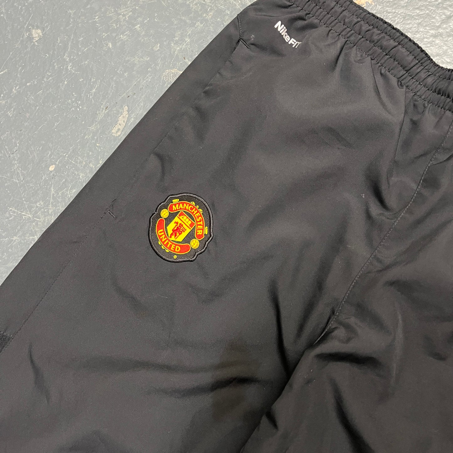 Nike Manchester united black track pants (S)