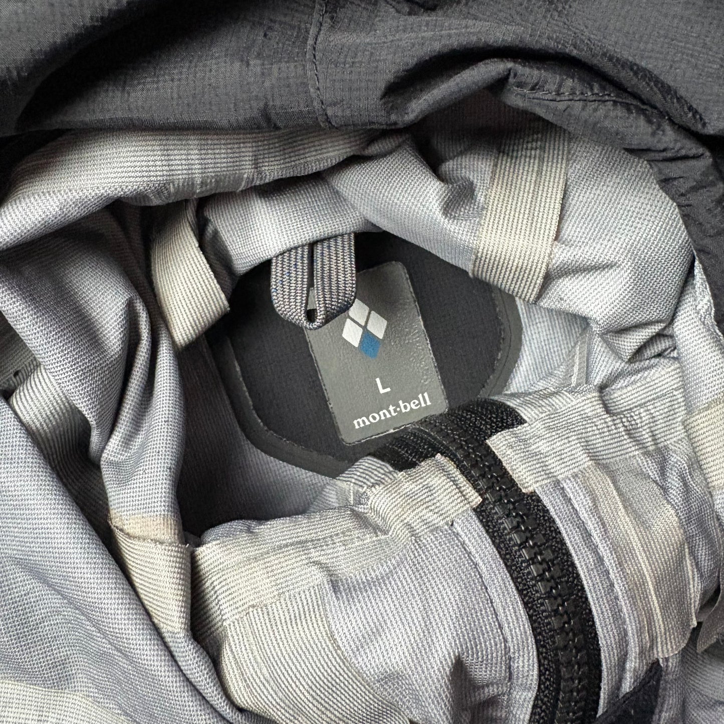 Montbell black waterproof shell jacket (L)