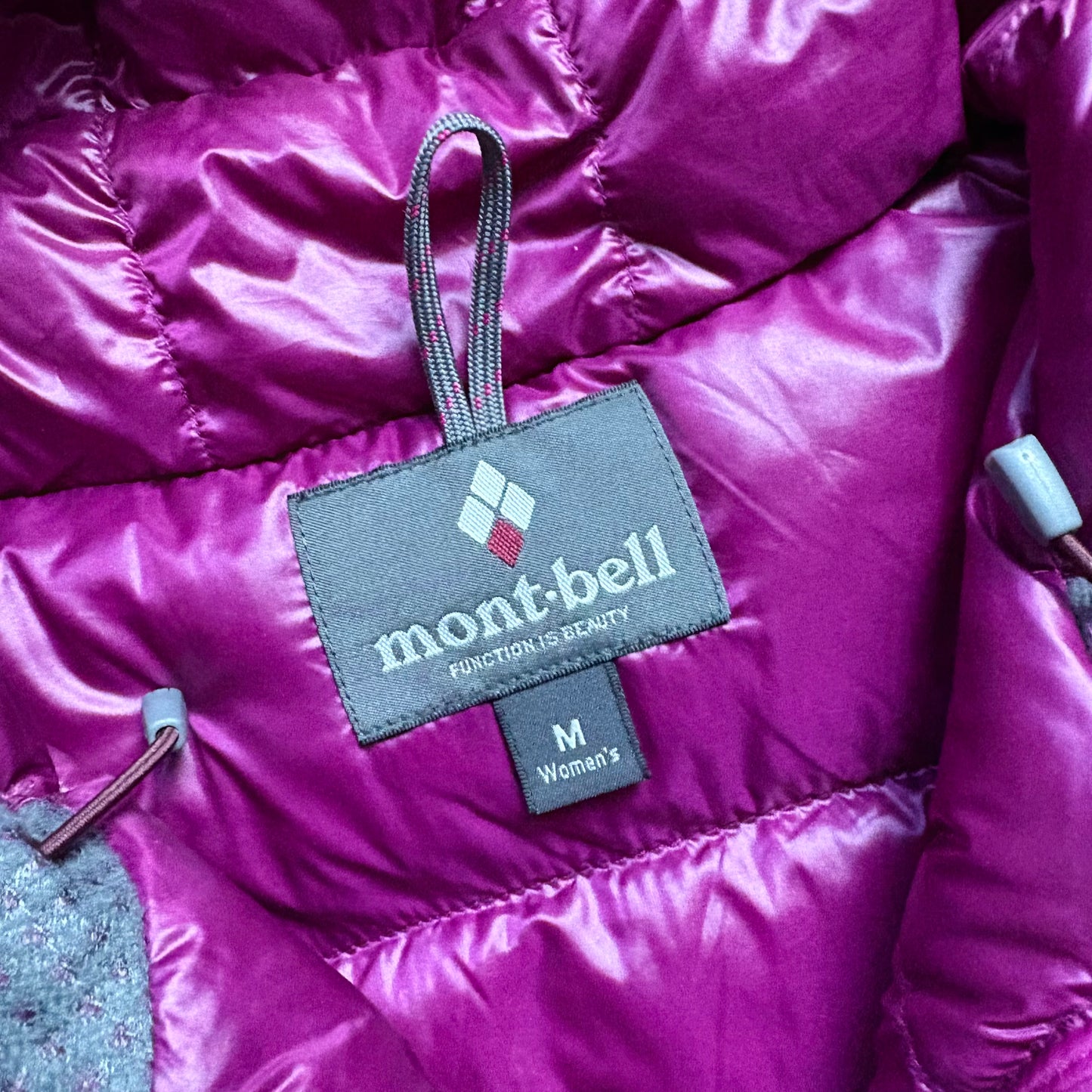 Montbell purple puffer jacket (WMNS M)