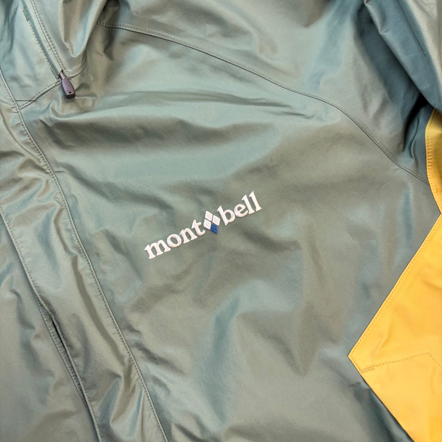 Montbell green and yellow waterproof shell jacket (L)