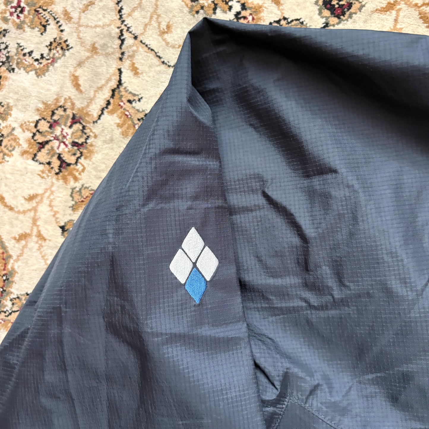 Montbell black waterproof shell jacket (M)