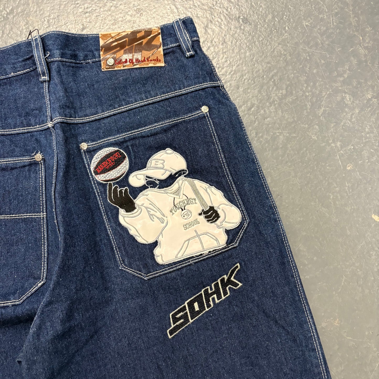 SOHK embroidered navy blue jeans (W32”)