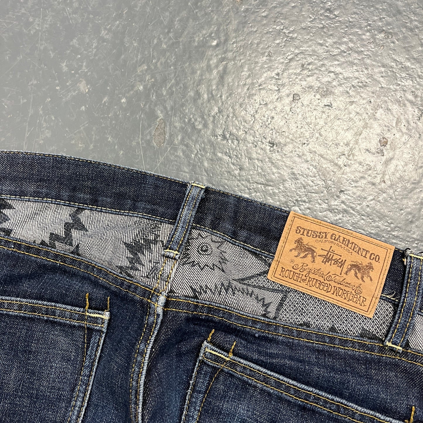 Stussy graphic dark denim jeans (W30)