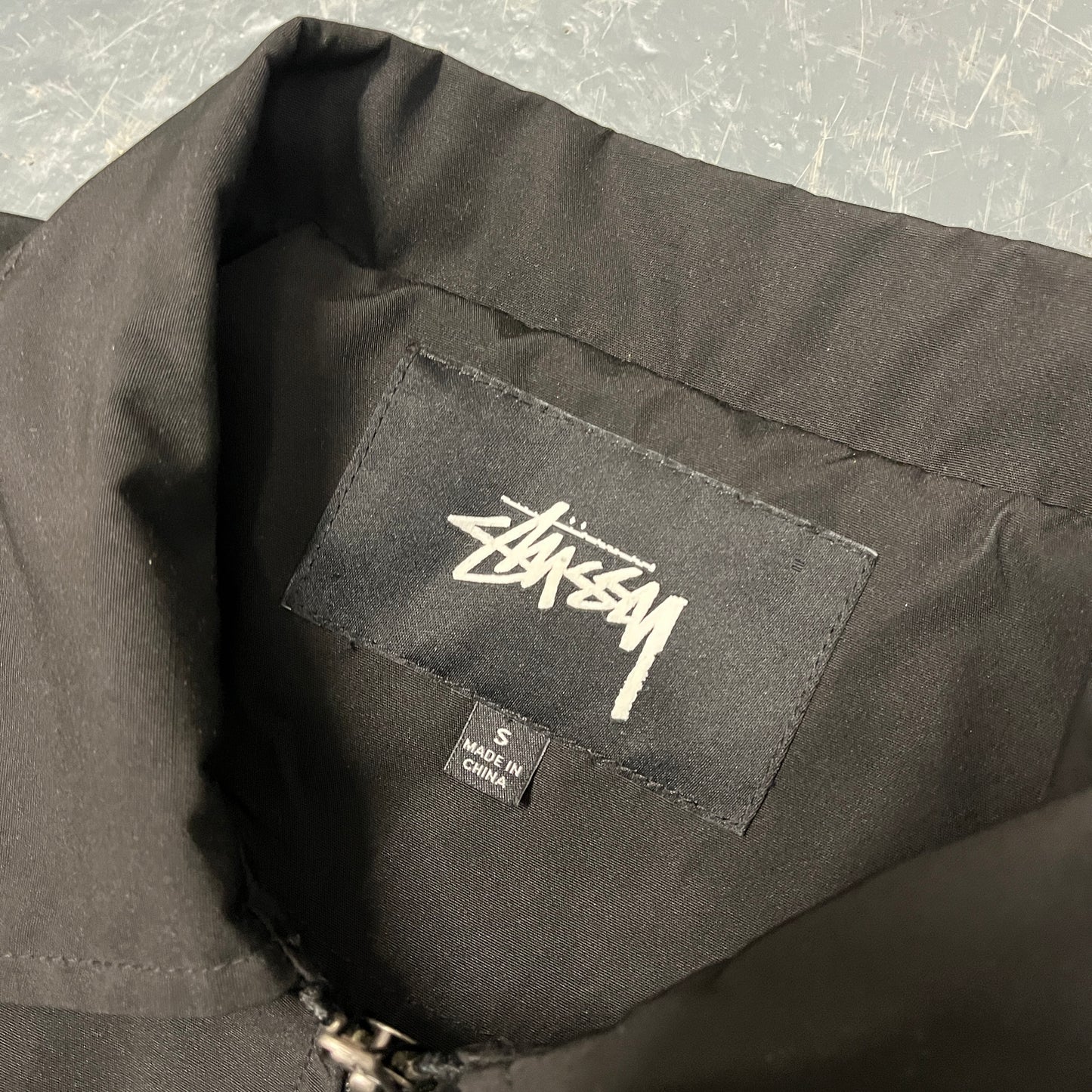 Stussy black surfboard jacket (S)