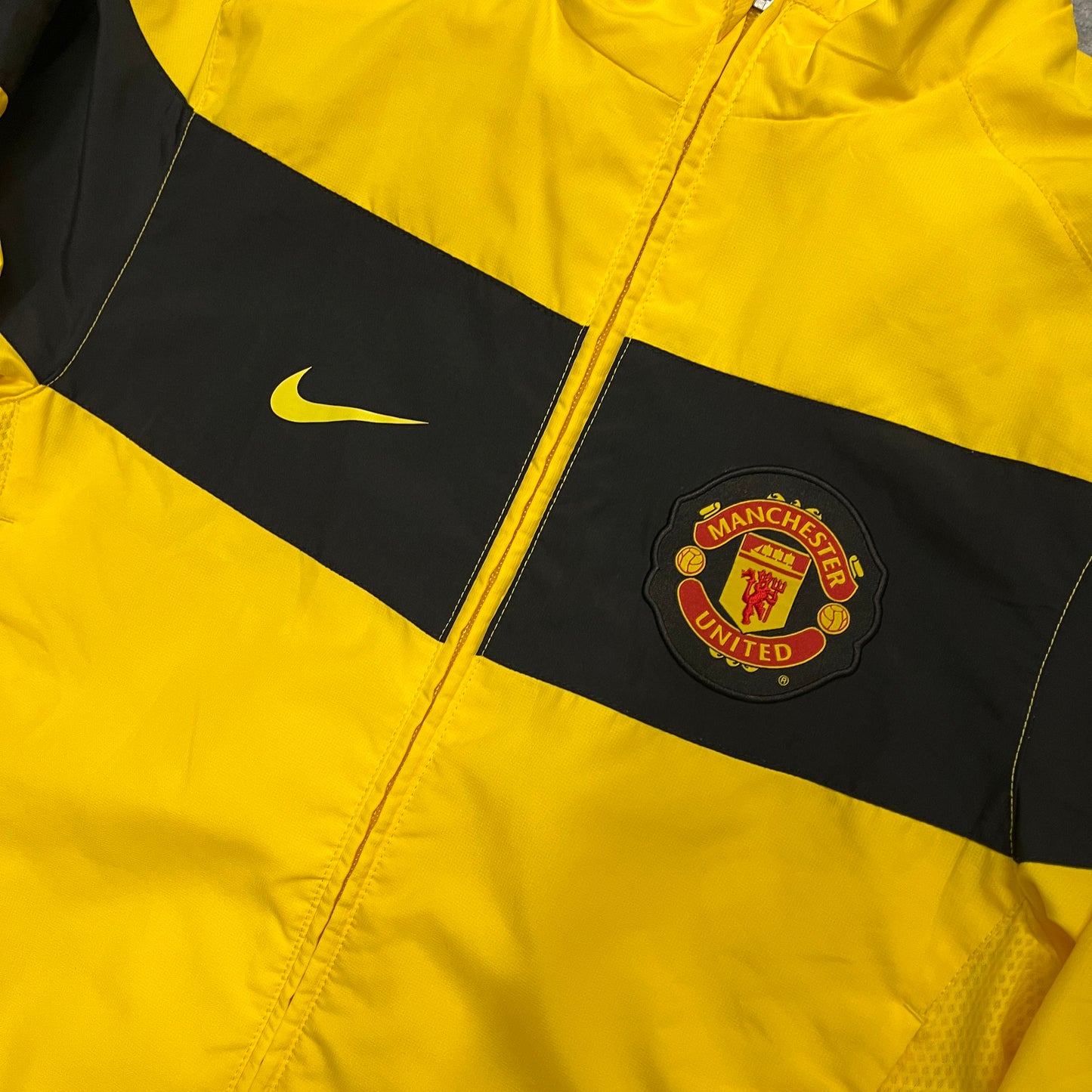 Nike Manchester United yellow and black track jacket (S)