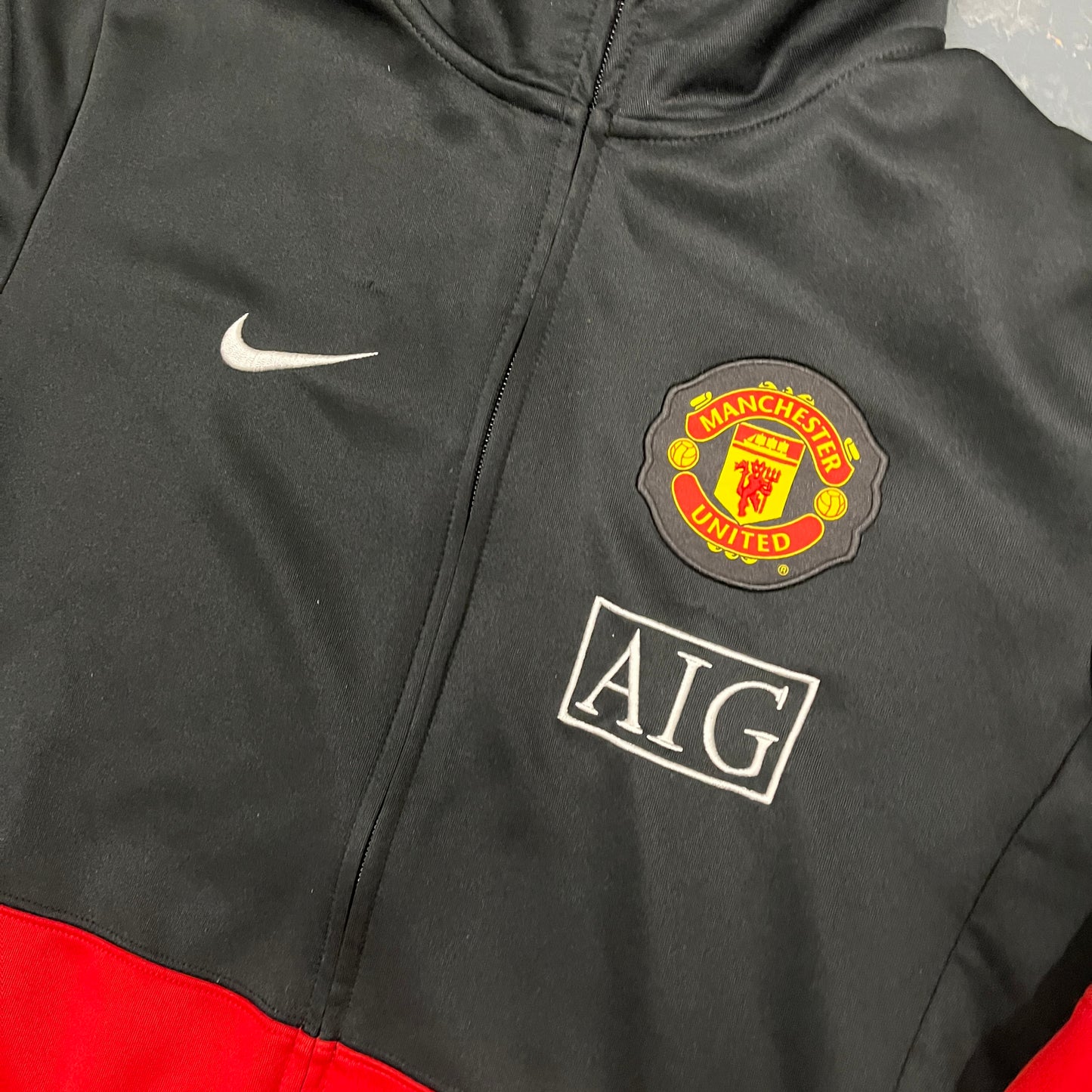 Nike manchester united black track jacket (S)