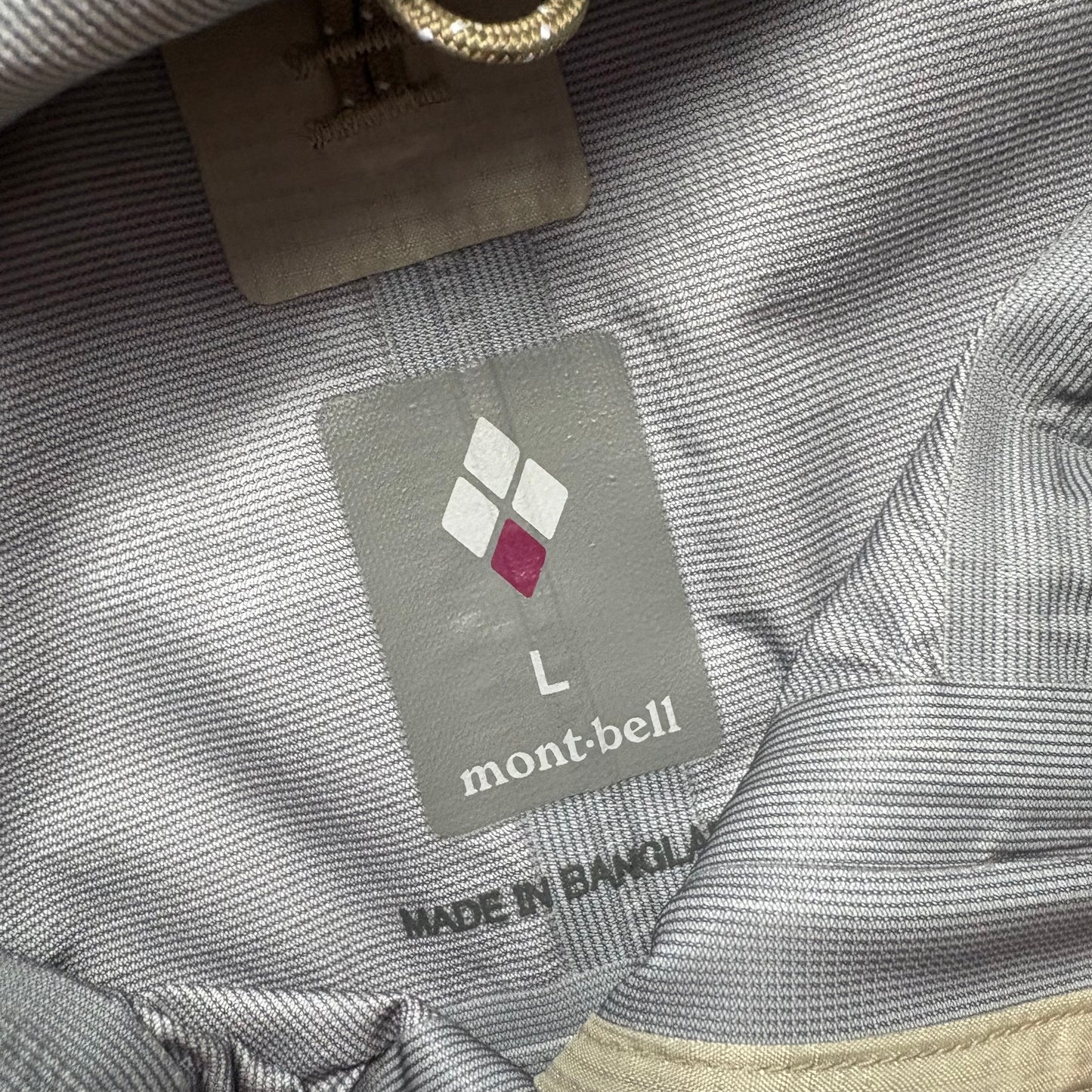 Montbell two tone beige waterproof shell jacket (L)