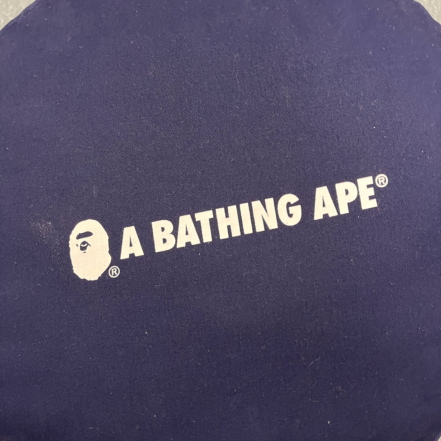 BAPE “busy works” navy cushion
