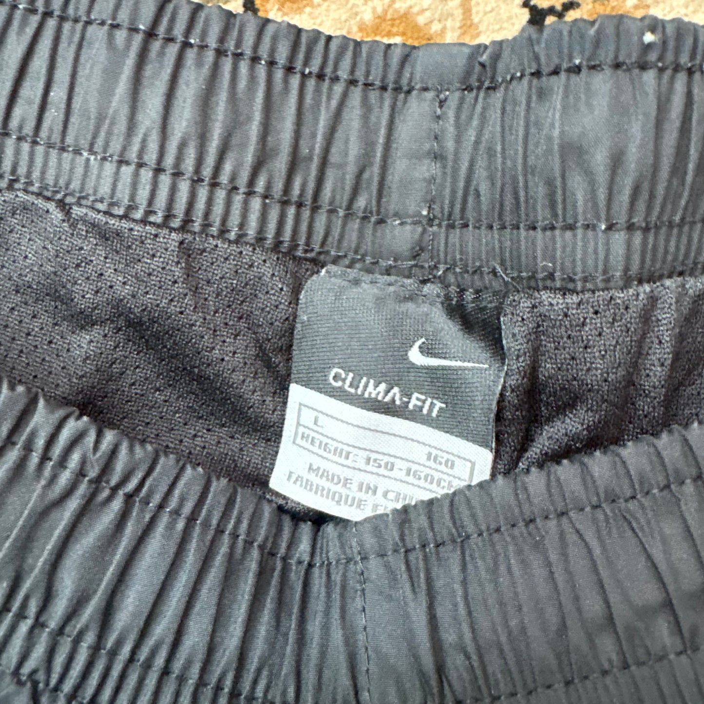 Nike T90 black track pants (M)