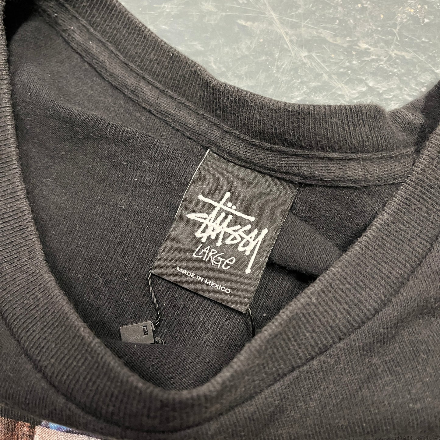 Stussy black SS collage graphic tee (L)