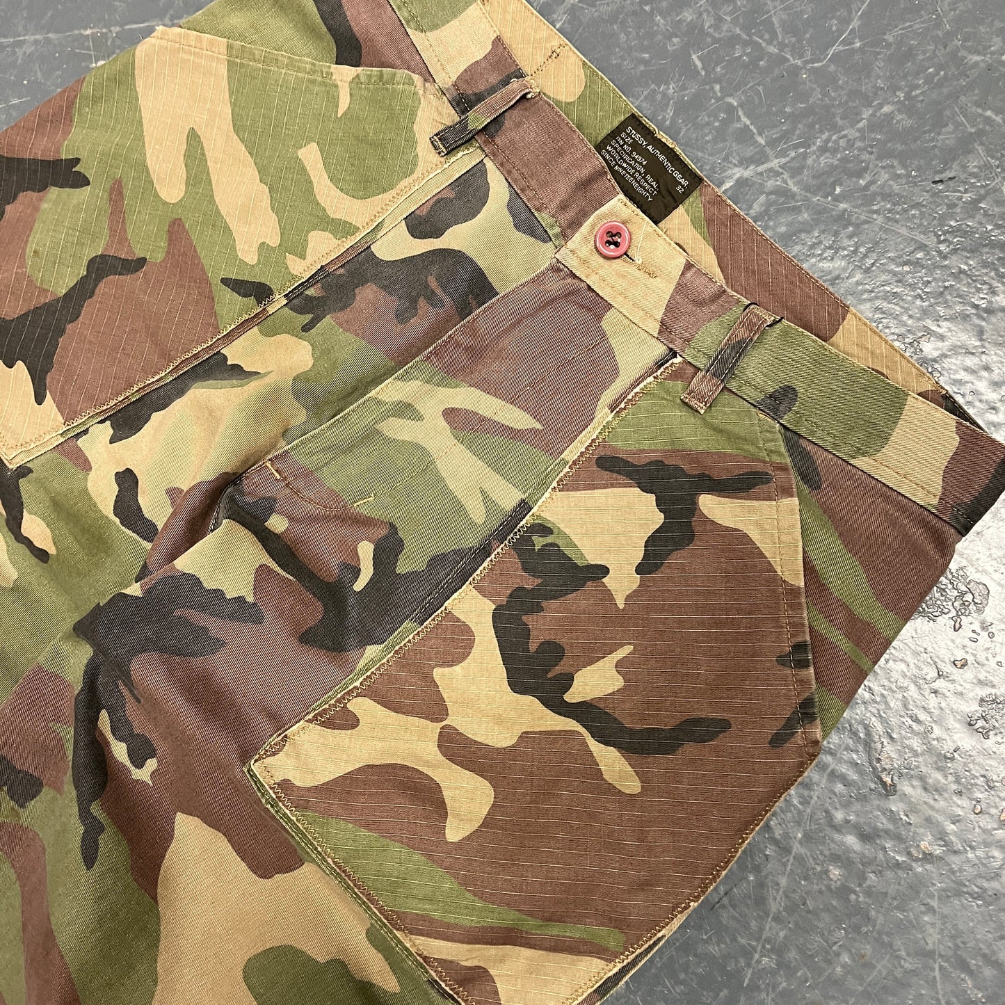 Stussy camo print cargo trousers (W34”L29”)