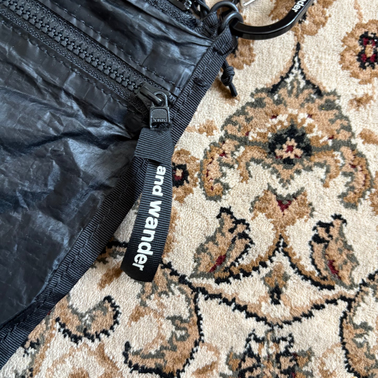 And Wander black sacoche crossbody bag