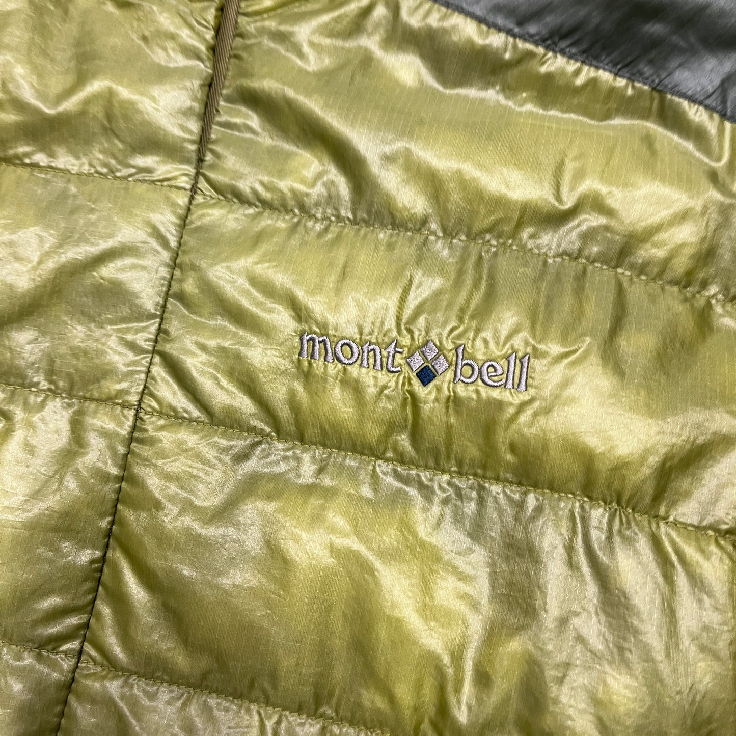 Montbell two tone green puffer (S) (read description)