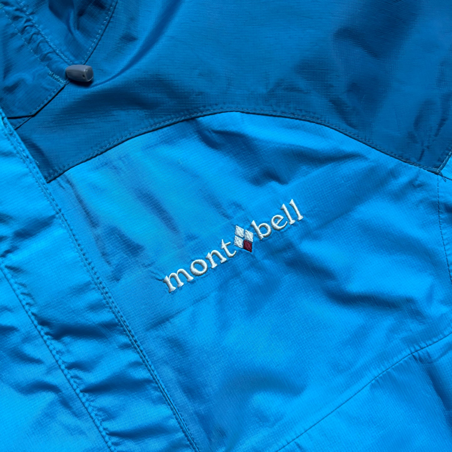 Montbell two tone blue waterproof shell jacket (L)