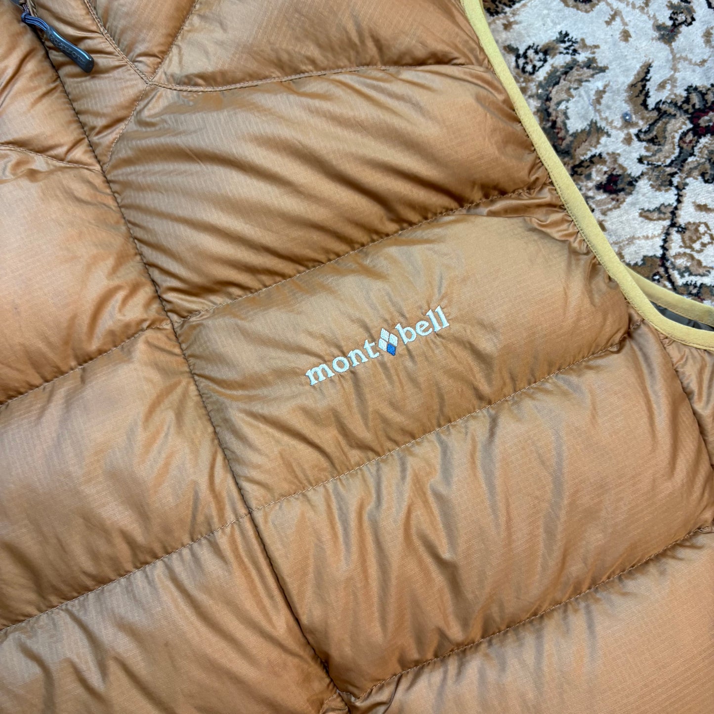 Montbell beige down gilet (M)