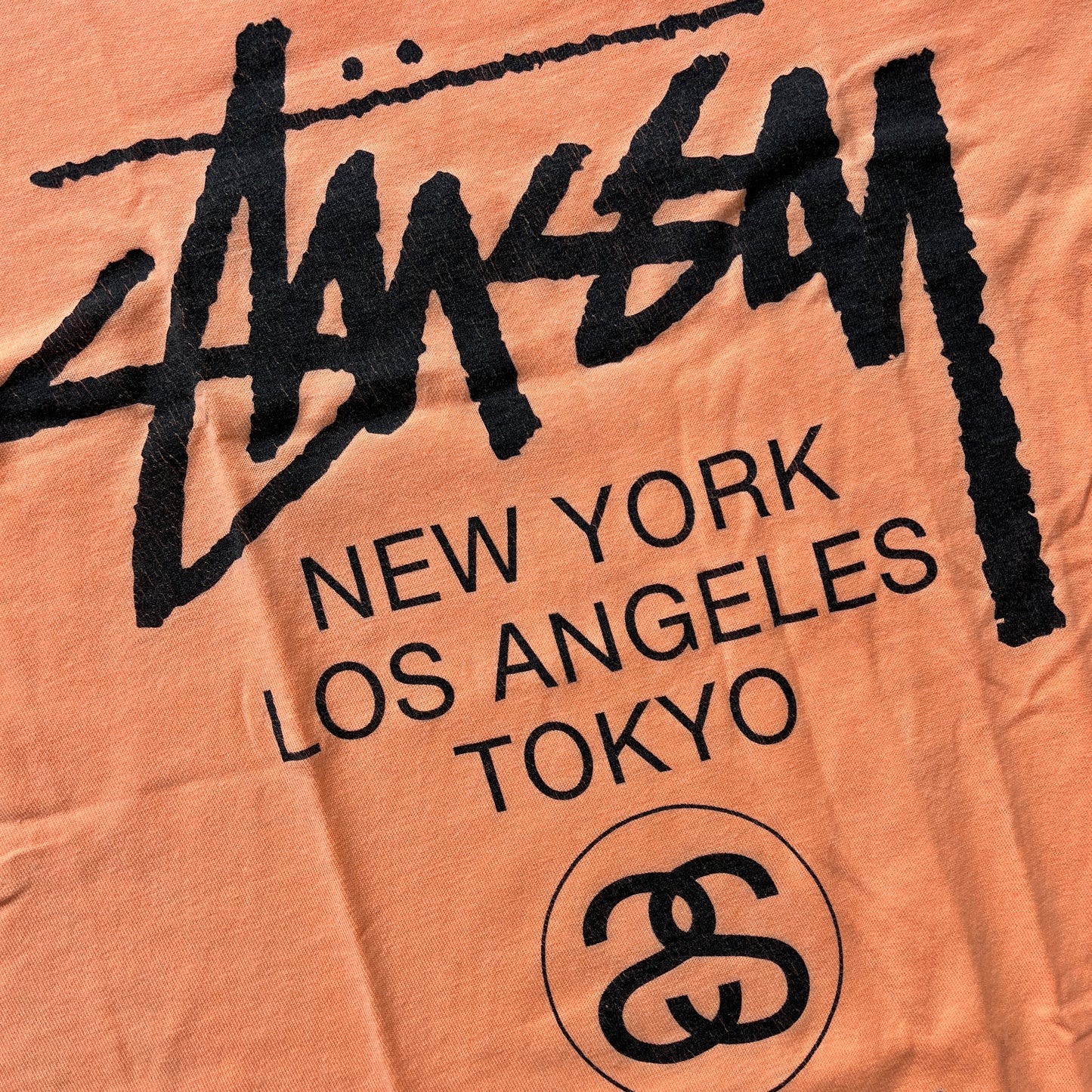 Stussy orange world tour spellout tee (L)