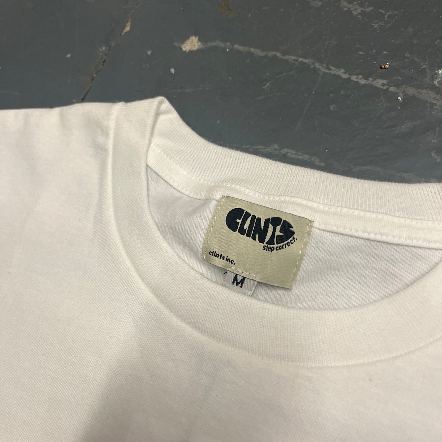 Clints inc white toast tee - never worn (M)