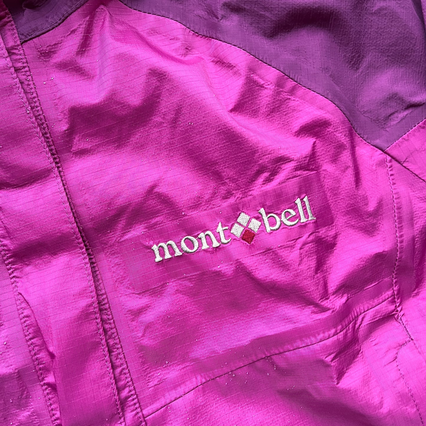 Montbell two tone purple spellout shell jacket