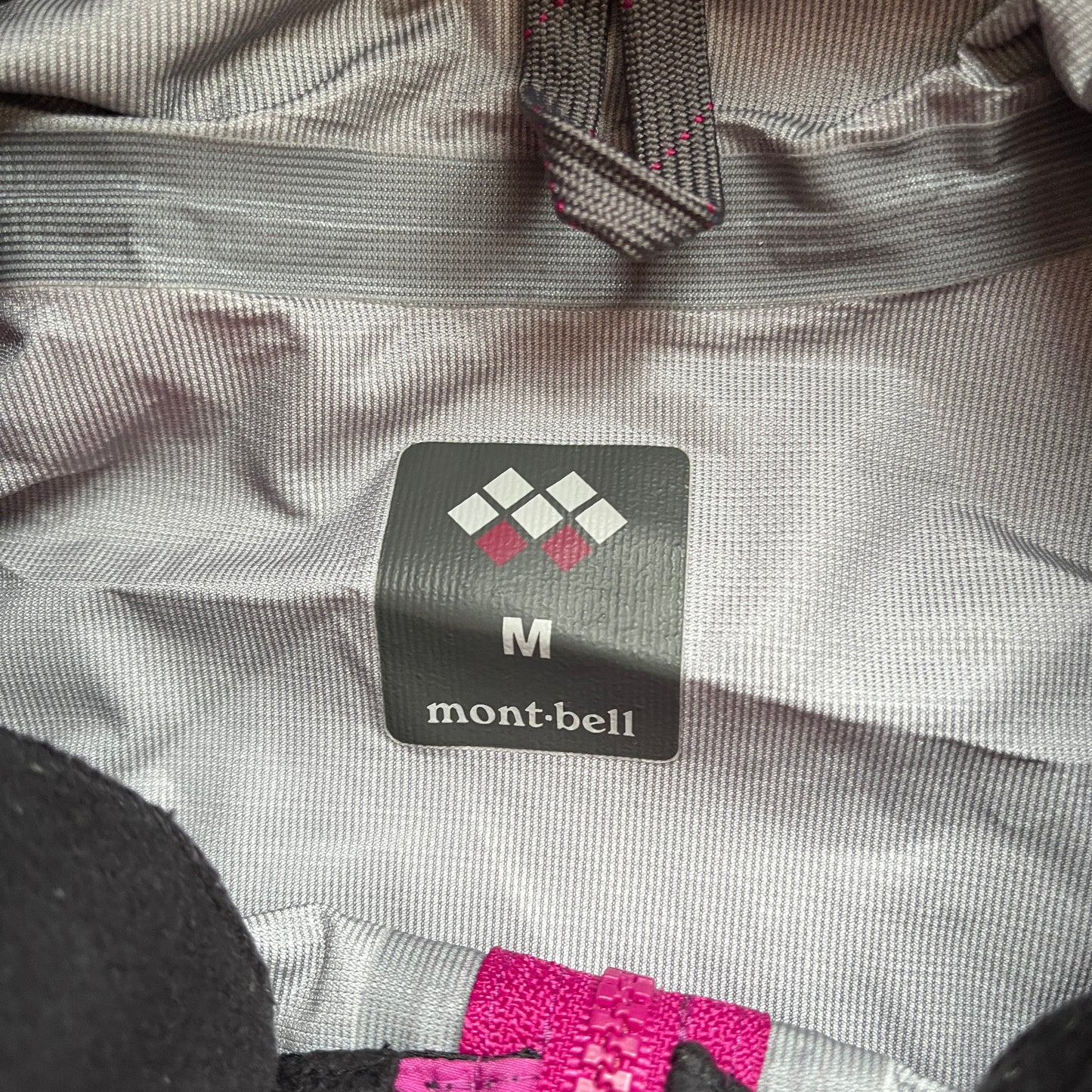 Montbell two tone purple spellout shell jacket